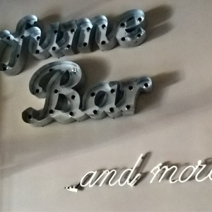 One piece embossed letters with LED lighting and bleu NEON letters